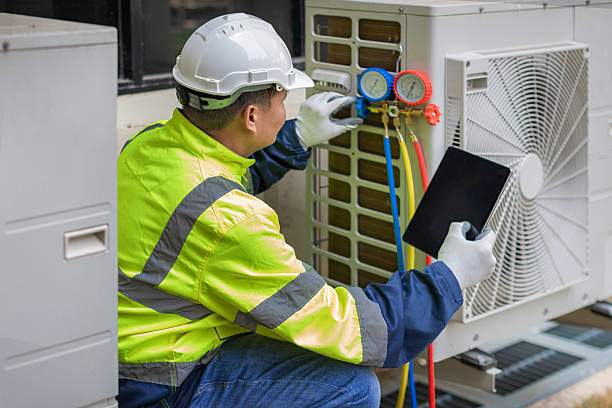 Professional Heat Pump Repair technician working in Pembroke, GA